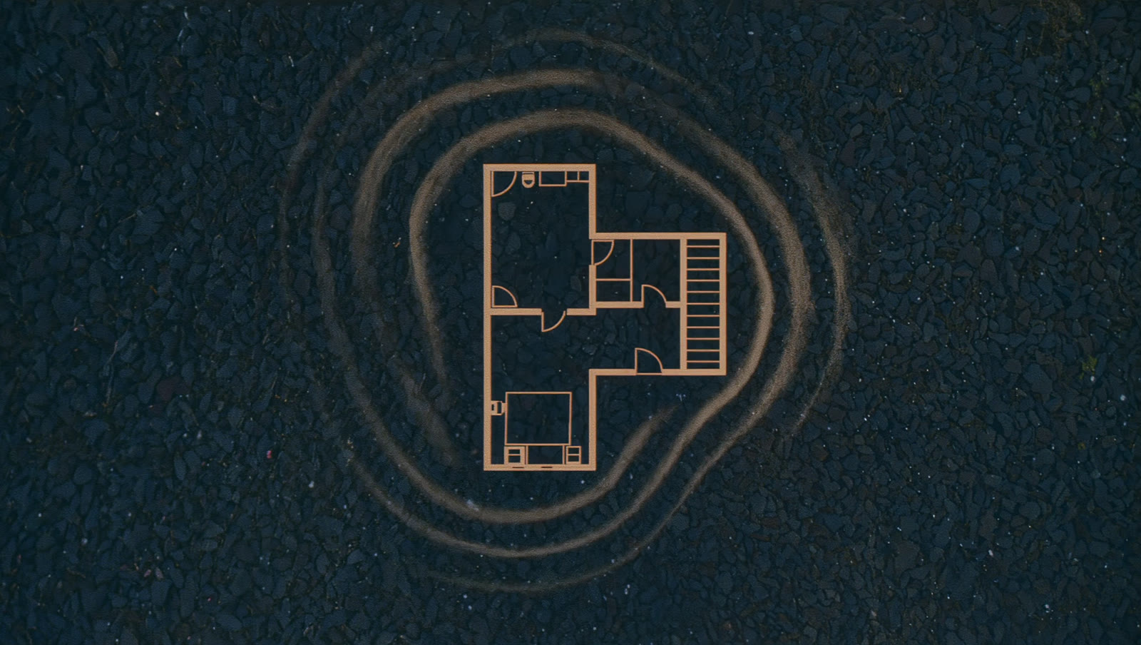 A minimal floor plan drawn in thin amber lines on deep blue, gentle ripples of light passing through the rooms.
